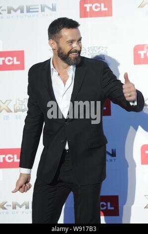 Australian actor Hugh Jackman poses during a premiere for his new movie, X-Men: Days of Future Past, in Beijing, China, 13 May 2014. Stock Photo