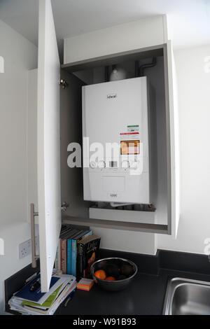 Kitchen wall mounted ideal logic combi esp1 35 boiler Stock Photo