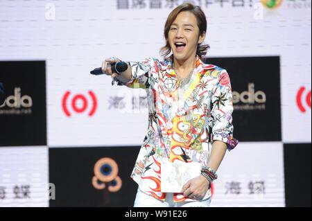 South Korean singer and actor Jang Keun Suk performs during a press conference to promote his new album, I JUST WANNA HAVE FUN, in Beijing, China, 14 Stock Photo