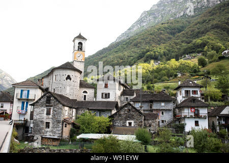 The church of Santa Maria Degli Angeli overlooks the tiny town of Lavertezzo in the Italian region of Ticino in Switzerland. Stock Photo