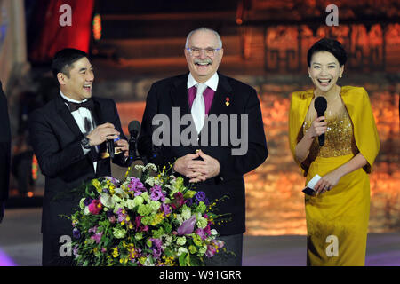Russian director Nikita Mikhalkov, center, smiles at the opening ceremony of the 3rd Beijing International Film Festival in Beijing, China, 16 April 2 Stock Photo