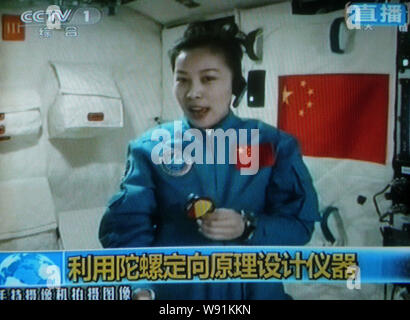 In this TV grab, Chinese astronaut Wang Yaping gives a lecture to ...