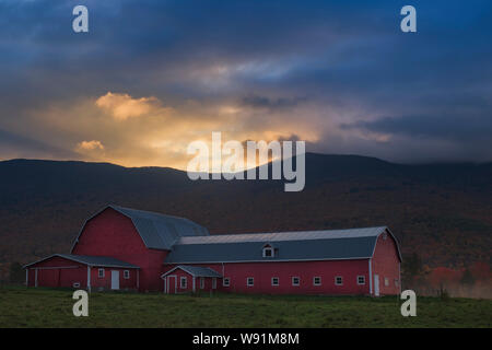 Red barn at sunrise, Northern Vermont Stock Photo