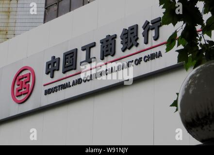 --FILE--A signage of ICBC (Industrial and Commercial Bank of China) is pictured in Yichang, central Chinas Hubei province, 5 August 2013.   China is d Stock Photo