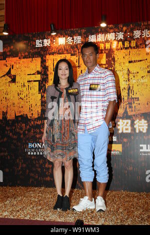 (From left) Chinese actress Zhou Xun and Hong Kong actor Louis Koo attend a press conference for their new movie, Overheard 3, in Hong Kong, China, 14 Stock Photo