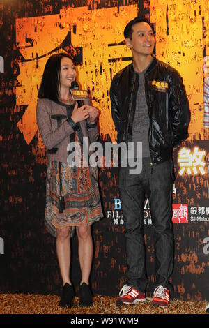 (From left) Chinese actress Zhou Xun and Hong Kong actor Daniel Wu attend a press conference for their new movie, Overheard 3, in Hong Kong, China, 14 Stock Photo