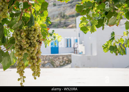 Street view of Potamos village with narrow alleys and traditional architecture in Antikythera island in Greece Stock Photo