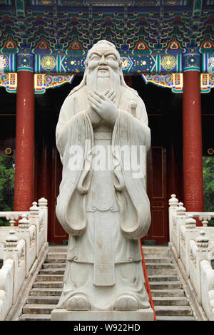 --FILE--A stone statue of Confucius is pictured at the Confucius Temple in Beijing, China, 5 June 2013.   A research team at Fudan University in Shang Stock Photo