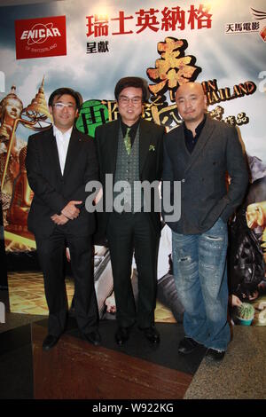 Hong Kong actor and producer Bak-Ming Wong, center, and Chinese director and actor Xu Zheng, right, attend the premiere of the movie Lost in Thailand Stock Photo