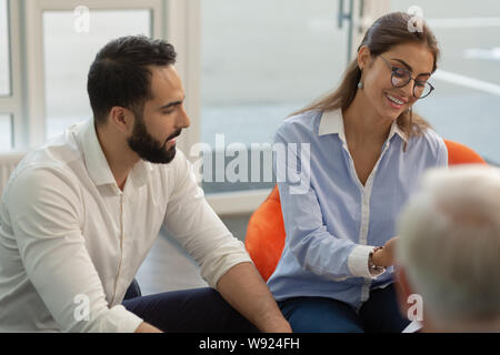Charming young female presenting her business idea Stock Photo