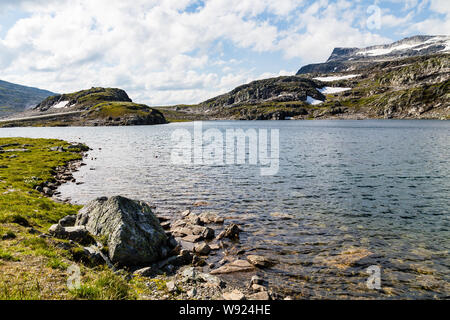Rough landscape along the National Scenic route Aurlandsfjellet between Aurland and Laerdal in Norway. Stock Photo