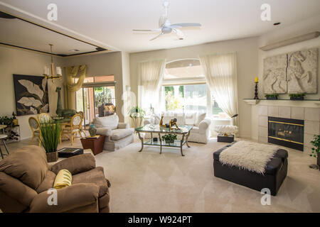 Modern Living Room And Dining Area Stock Photo