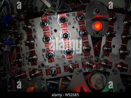 Many switches are seen on the back of the robot made from scrap by Chinese farmer Tao Xiangli at his home in Beijing, China, 16 May 2013.   Tao Xiangl Stock Photo