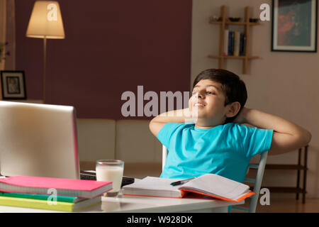 Boy studying at home Stock Photo