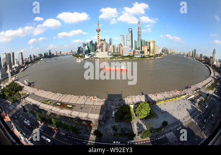 Panoramic view of the promenade on the Bund, front, along the Huangpu River and the Lujiazui Financial District with the Shanghai Tower, tallest, unde Stock Photo