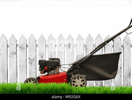 Lawn mower mows lawn. Is isolated. on a white background Stock Photo