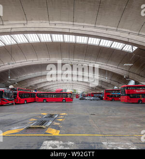 Stockwell Bus Garage opening in 1952 was then Europe's largest unsupported roof span. The garage provides unobstructed parking space for 200 buses. Stock Photo