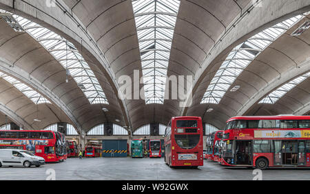 Stockwell Bus Garage opening in 1952 was then Europe's largest unsupported roof span. The garage provides unobstructed parking space for 200 buses. Stock Photo