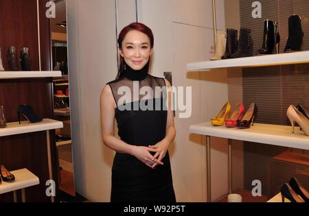 Singaporean actress Fann Wong poses during the 35th anniversary event for the Salvatore Ferragamo Vara in Shenyang, northeast Chinas Liaoning province Stock Photo