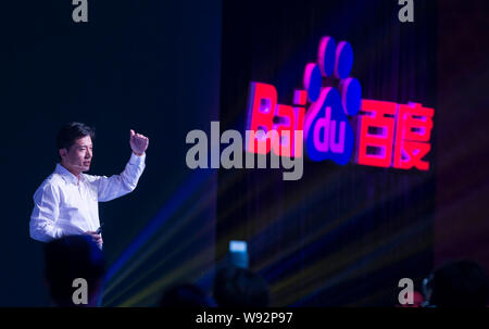 --FILE--Robin Li Yanhong, Chairman and CEO of Baidu, speaks at the Baidu Technology Innovation Conference 2013 in Beijing, China, 22 August 2012.   Th Stock Photo