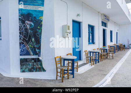 Street view of Potamos village with narrow alleys and traditional architecture in Antikythera island in Greece Stock Photo