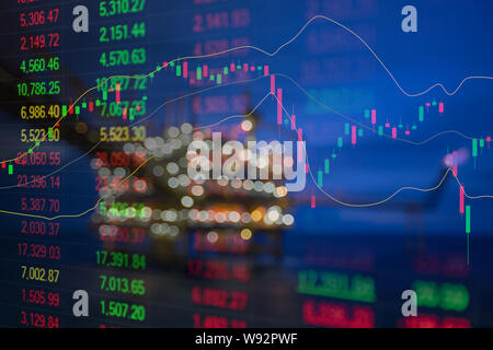 Graph of stock market data and financial with indicator, pricing display on offshore oil and gas processing platform background for world energy and o Stock Photo