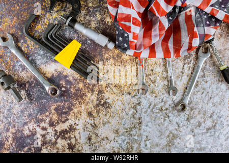 USA flag and construction tools happy Labor day copy space for text on background. Stock Photo