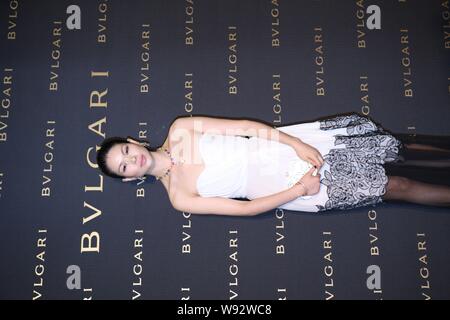 Chinese model Lv Yan poses at the opening ceremony of Bvlgari flagship store in Shanghai, China, 15 January 2013. Stock Photo