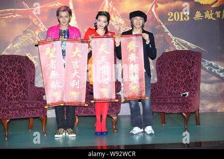 (From left) Hong Kong actor and singer Show Lo, actress Shu Qi, actor and director Stephen Chow hold couplets with blessings during the press conferen Stock Photo