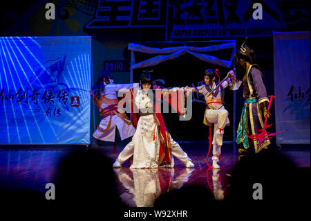 Chinese contestants dressed in the costumes of the figures in the  electronic video game KOF (The King Of Fighters) perform in the final of the  10th Su Stock Photo - Alamy