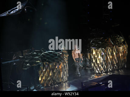 Canadian pop singer Justin Bieber performs during his 2013 Believe World tour concert in Shanghai, China, 5 October 2013. Stock Photo