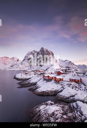 Red houses and beautiful mountain in Stunning Norway Stock Photo