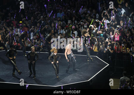 Canadian pop singer Justin Bieber performs during his 2013 Believe World tour concert in Shanghai, China, 5 October 2013. Stock Photo