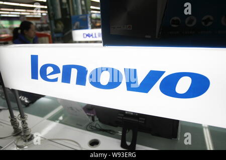 --FILE--Lenovo laptop computers are for sale at a supermarket in Nantong city, east Chinas Jiangsu province, 25 November 2012.   Lenovo Group Ltd., th Stock Photo