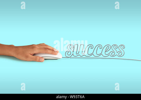 Computer mouse with its wire making a word success Stock Photo