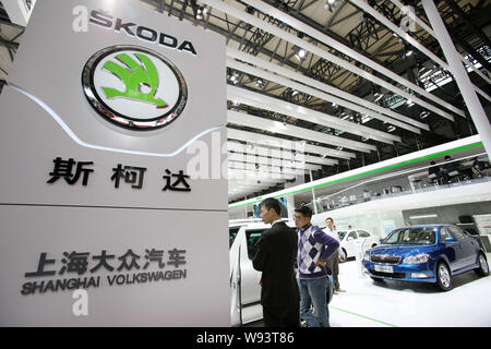 --FILE--People visit the stand of Skoda of Shanghai Volkswagen during the 15th Shanghai International Automobile Industry Exhibition, known as Auto Sh Stock Photo
