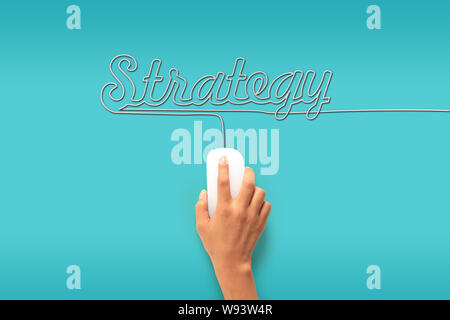 Computer mouse with its wire making a word strategy Stock Photo