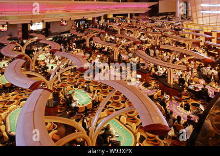 FILE--Night view of the Sands Macao Casino, owned by the Las Vegas Sands  Corporation, in Macao, China, 28 March 2015. It's been a while since inve  Stock Photo - Alamy