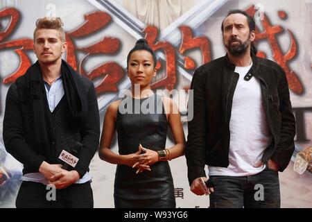 (From left) Canadian actor Hayden Christensen, Chinese singer Summer and American actor Nicolas Cage pose during a press conference for their new movi Stock Photo