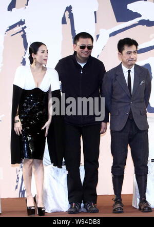 Taiwanese actor Zhang Zhen (left), Hong Kong director Wong Kar-wai (center) and Hong Kong actor Tony Leung  pose for a group photo during the premiere Stock Photo