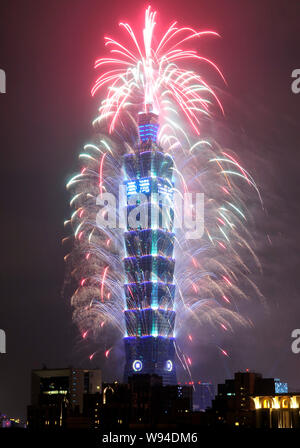 Fireworks explode on the Taipei 101 during a New Year