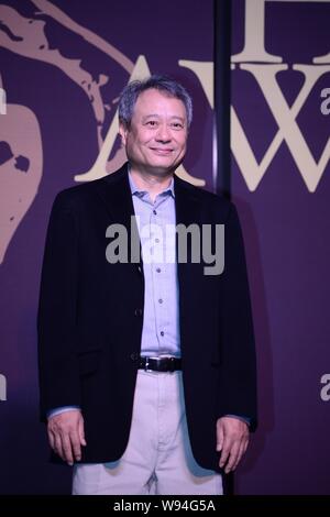Taiwanese director Ang Lee poses during a press conference for the jury of the 50th Golden Horse Awards in Taipei, Taiwan, 12 November 2013. Stock Photo