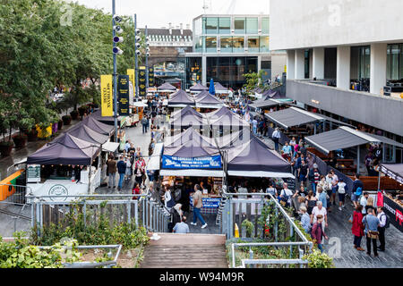 Shoppers at the Friday food market at the Southbank Centre, Waterloo, London, UK Stock Photo