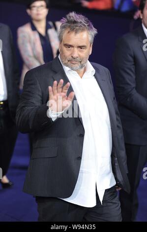 French director Luc Besson waves as he arrives for the closing ceremony of the 3rd Beijing International Film Festival in Beijing, China, 23 April 201 Stock Photo