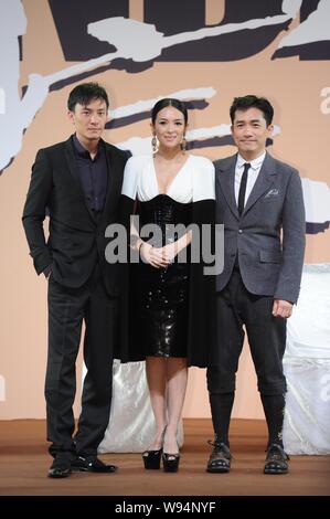 Taiwanese actor Zhang Zhen (left), Chinese actress Zhang Ziyi (center) and Hong Kong actor Tony Leung pose for a group photo during the premiere of th Stock Photo