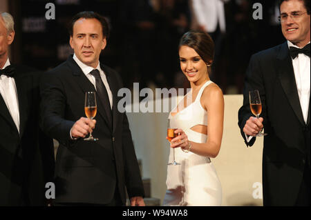 (From left) Lutz Bethge, Managing Director of Montblanc International, U.S. actor Nicolas Cage, actress Jessica Alba and James Siano, President and CE Stock Photo