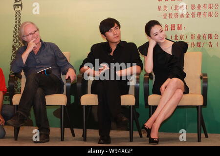 French director Philippe Muyl (L), Chinese actor Qin Hao (C) and actress Li Xiaoran are pictured during a press conference for their new movie, The Ni Stock Photo