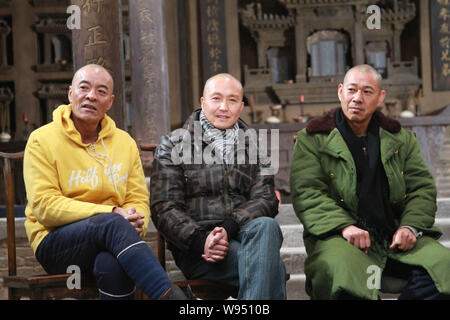 --File--(From left) Chinese actor Liu wei, Wu Gang and Zhang Fengyi are pictured during a press conference at the filming location of the movie, White Stock Photo