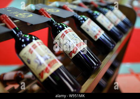 --File--Bottles of imported wine are for sale at a supermarket in Haikou city, south Chinas Hainan province, 24 June 2011.    Foreign wine imports are Stock Photo