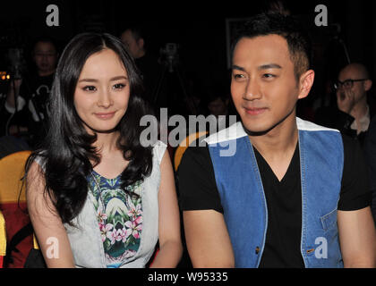 Chinese actress Yang Mi and Hong Kong actor Hawick Lau are pictured during a press conference for a new TV series in Beijing, China, 27 March 2012. Stock Photo